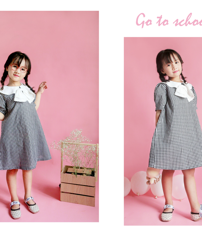 Váy chữ A kẻ nơ trắng