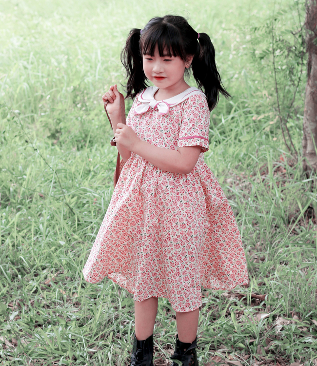 Váy  hoa hồng cổ nơ trắng